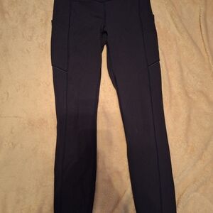 Lululemon, Back on track leggings, size 4, Navy blue, low-rise, slight stretch.